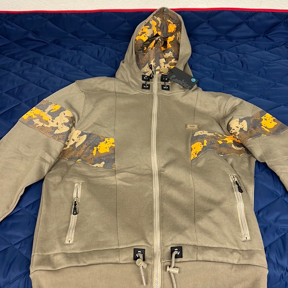 A brand new zip up Cookies brand sweatshirt